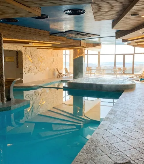Indoor swimming pool and jacuzzi at Villa Alicante SPA near Vilnius